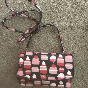 kate spade brown crossbody with pink, red & white dessert print